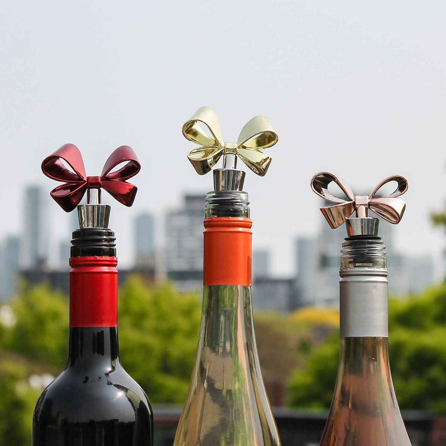 RED, GOLD, & ROSE BOWS WINE STOPPER SET