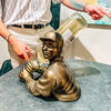 BRONZE BASEBALL PLAYER WINE BOTTLE HOLDER